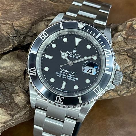 rolex submariner date lc100|Rolex Submariner dial.